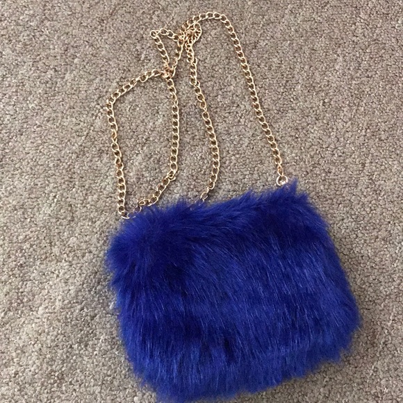 blue faux fur bag